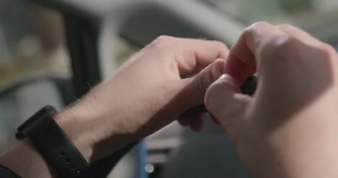 Man's Hands on Steering Wheel Driving Stock Footage 169676893