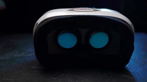 Mans hands take off vr glasses at white background. Virtual reality mask with Stock Footage 105032979
