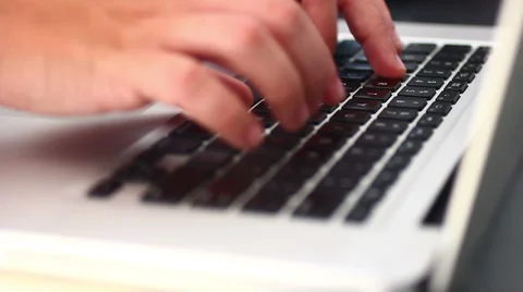 Man's hands typing on a keyboard Stock Footage 53527920