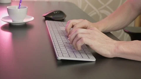Man's hands typing on keyboard Stock Footage 81564242