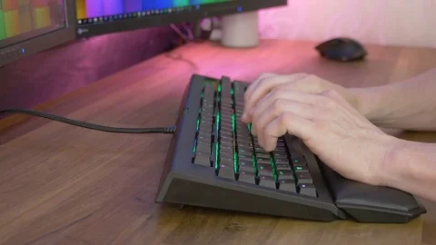 Man's hands typing on keyboard Stock Footage 81594333