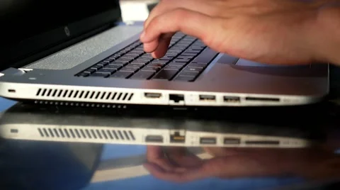 Man's Hands Typing on Laptop. Stockbeeldmateriaal 45156442