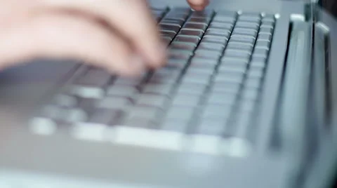 Man's hands typing on laptop keyboard Stock Footage 55494350