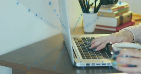 Man's hands typing on laptop keyboard activating blue numeric data streams Stock Footage 317183760