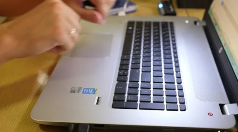 Man's Hands Typing on Notebook Keyboard. Vídeo Stock 43017748