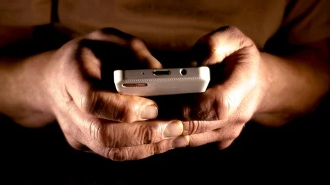 Man’s hands typing on a phone. Stock Footage 71406688
