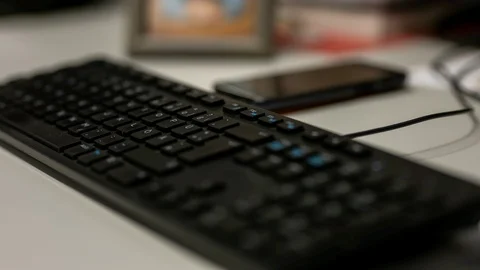 Man's hands typing on QWERTZ computer keyboard Stock Footage 122053481