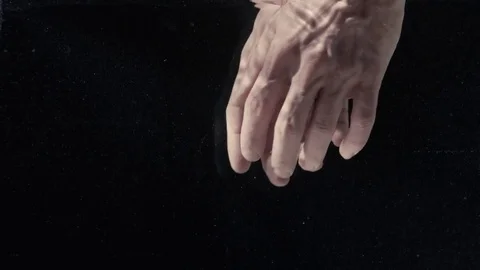 Man's hands under water Stock Footage 73256847