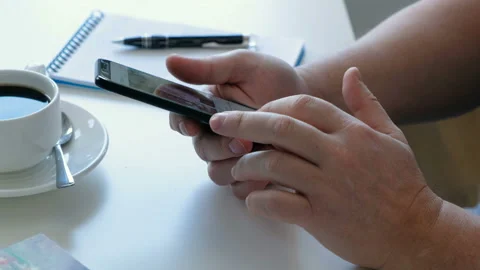 Man's hands using a smartphone Stock Footage 104122526