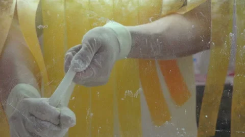 Man's Hands Working With Dough To Make Noodles 02 Stock Footage 55554013
