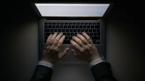 Man's Hands Working on the Laptop at Night Stock Footage 84534308
