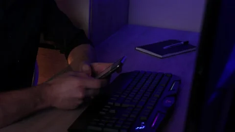 A man's hands write messages on his phone Stock Footage 169326190