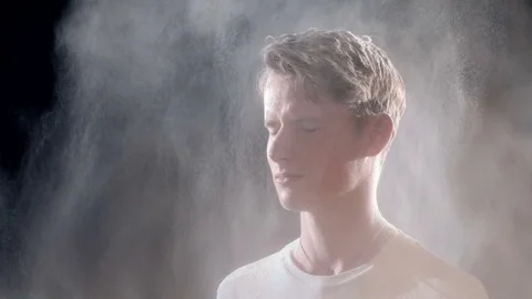 Man's head getting hit from behind by a cloud of dirt Stock-Footage 74000135