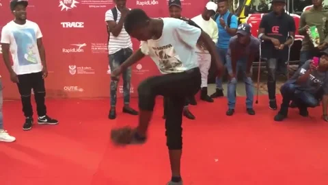 Man’s incredible hacky sack routine with a hat wows crowd Stock Footage 272890332