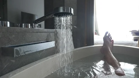 Man's legs in a bathroom of hotel Stock Footage 87938792