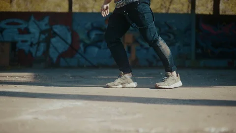 Mans legs dancing in empty building Video stock 117918170