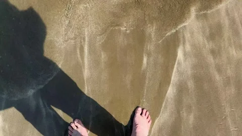 A mans legs walk on the beach 2 Video stock 318327943