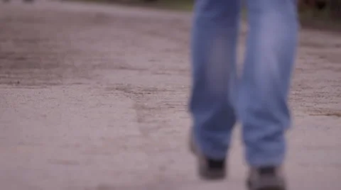 Man's Legs Walking on Path Stock Footage 53049985