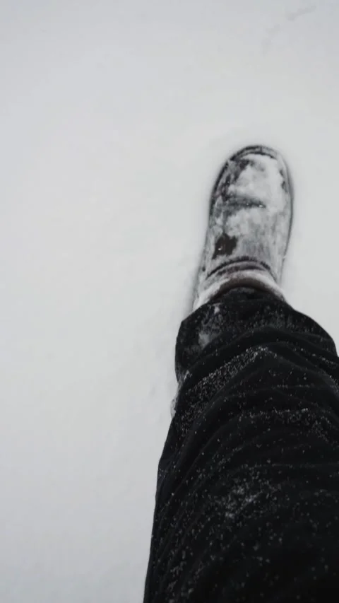 Man's legs walking through thick snow Stock Footage 326064087