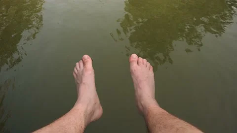 A man's legs in the water Video stock 160340779