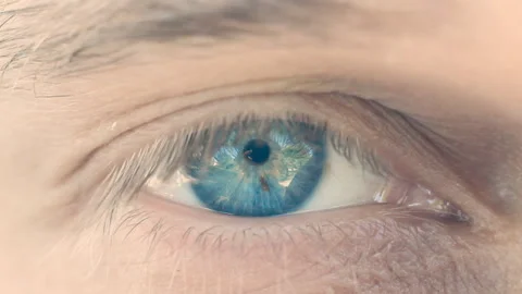 Man's macro eye with blue iris are blink Stock Footage 90266506