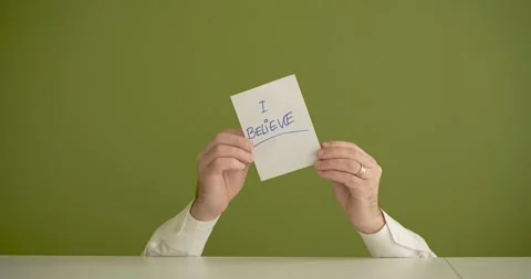 The man's mini picks up a sheet where it is written I believe Stock Footage 267092470