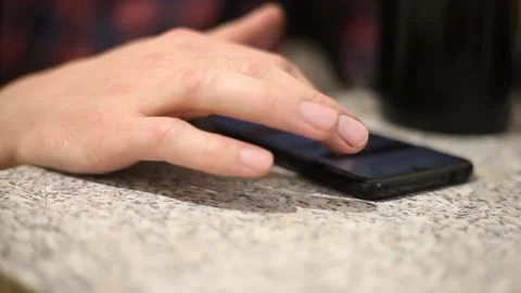 Man's palm prints on the screen of a mobile phone. Stock Footage 136167100
