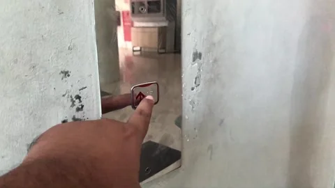 Man's Pressing Elevator Button Stock Footage 320820951