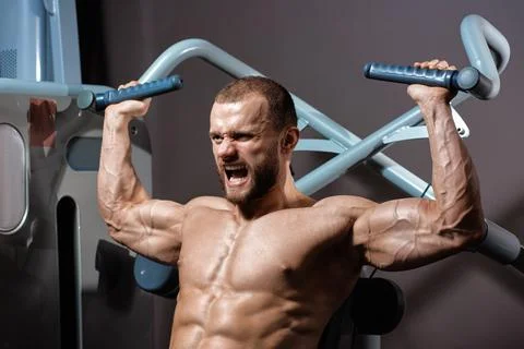 Mans pulling-up exercise Stock Photos