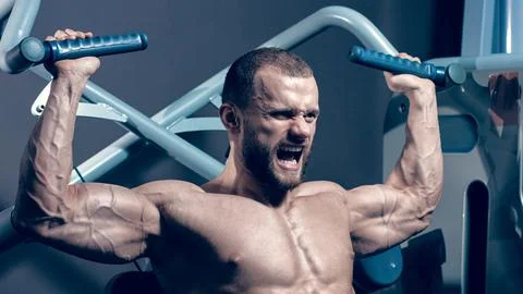 Mans pulling-up exercise Stock Photos