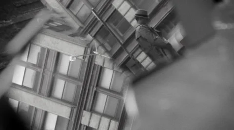 Man's Reflection In Glass As He Stands In Street Stock Footage 27236174