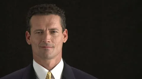 Man's Serious Face on Black Background Stock Footage 10902796