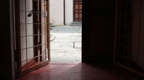 Man's silhouette is going through cell door. Exit. Video stock 49642678