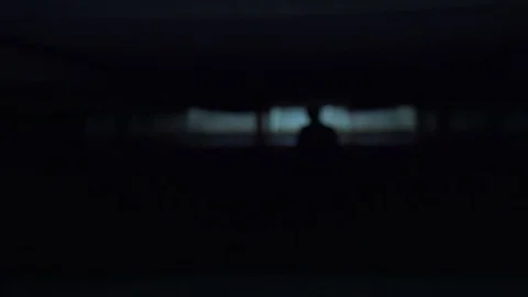 Man's silhouette walks through underground crossing Видео 81595594