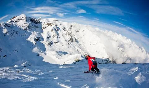 Man's skiing downhill Stock Photos