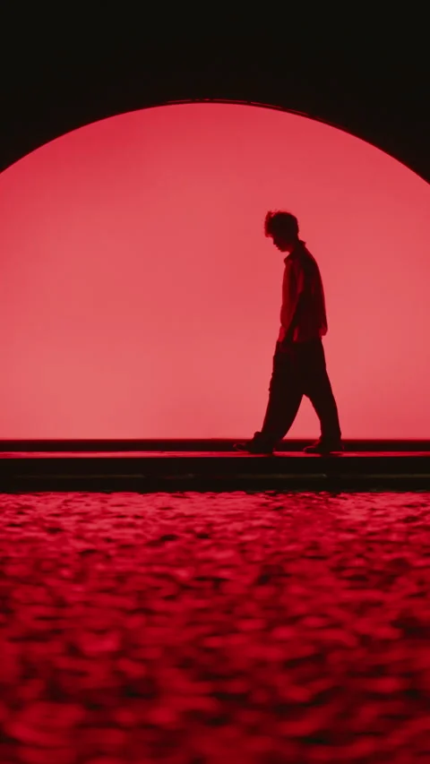 Man's Slow Motion Dance By Waterfront Stage With Red Light Stock Footage 255538238