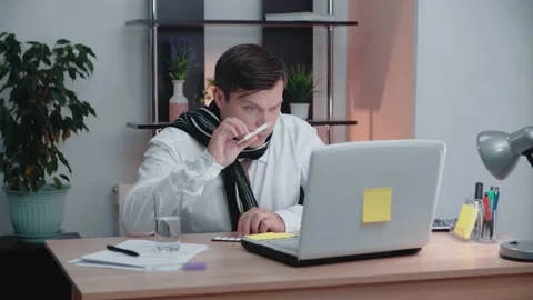 A man's temperature, he shows his thermometer via video link. Concept of health. Stock Footage 147668691