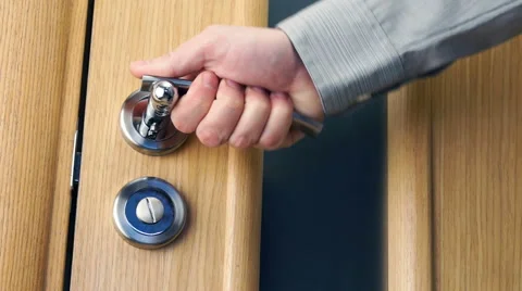 Man's trying to open a door Stock Footage 60704945