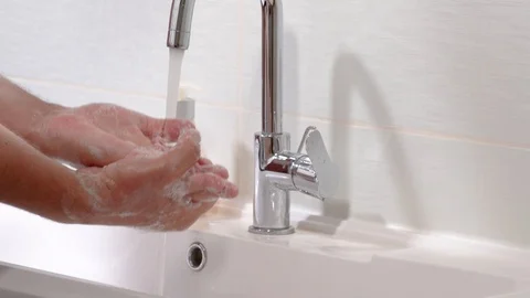 Man's washing him hands using soap foam Close up Prevention Stock Footage 127035098