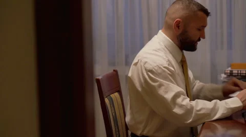 Man's working on the computer at home office  Stock Footage 62087566