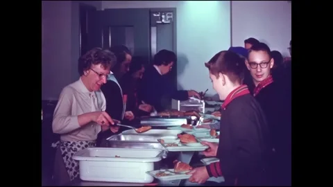 MANSFIELD - 1958 - Students are being served lunch at St. Peter's Catholic Stock Footage 340658373