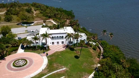Mansion by water and trees7 Stock Footage 89949248