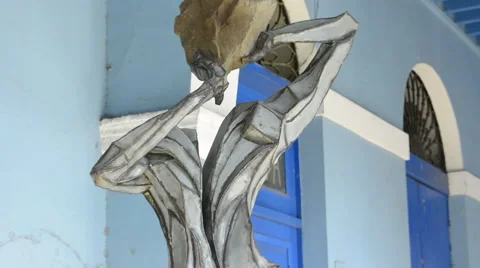 Mantanzas Cuba artwork outside Ediciones Vigia bookstore with blue building in Stock-Footage 65358628