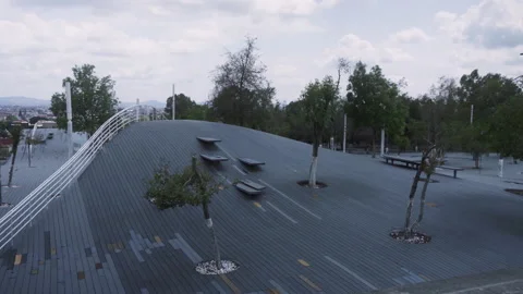Mantarraya Park wide view in Los Fuertes Puebla with wooden architecture Stock Footage 345179236