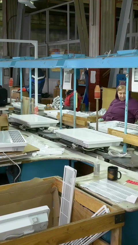 Manual assembly conveyor. Vertical video. Stock Footage 269664334