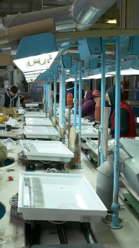 Manual assembly conveyor. Vertical video. Stock Footage 269664338