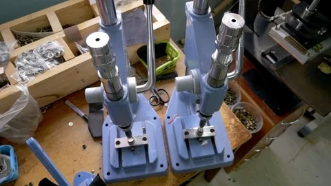 Manual Button Press Machines on table Stockbeeldmateriaal 118136075