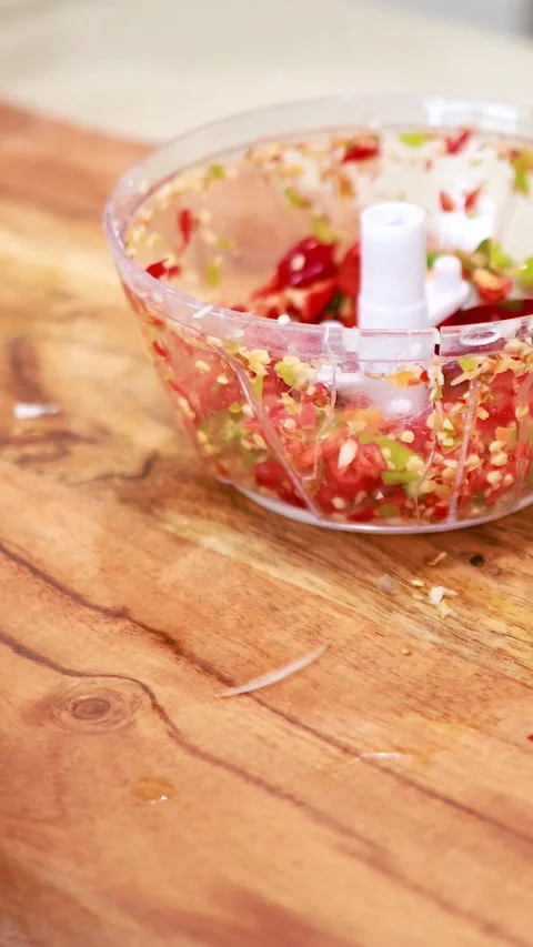 Manual Chopper Prepares Ingredients in Kitchen Setting Stock Footage 307370289