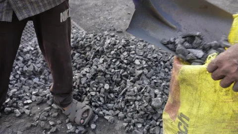 Manual Coal Loading with Shovel Stock Footage 326148897