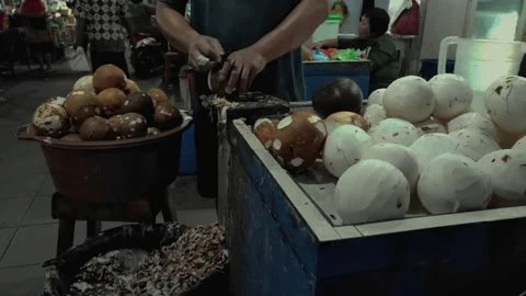 Manual Coconut Peeling Process To Become Coconut Milk Stock Footage 232361715